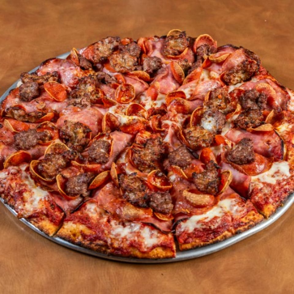 Indulge in Our Meat Pizza