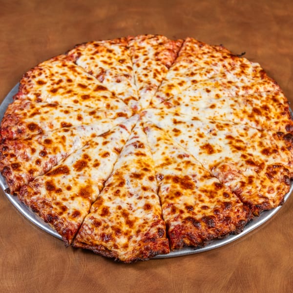 A whole cheese pizza, cut into slices, on a metal pan.